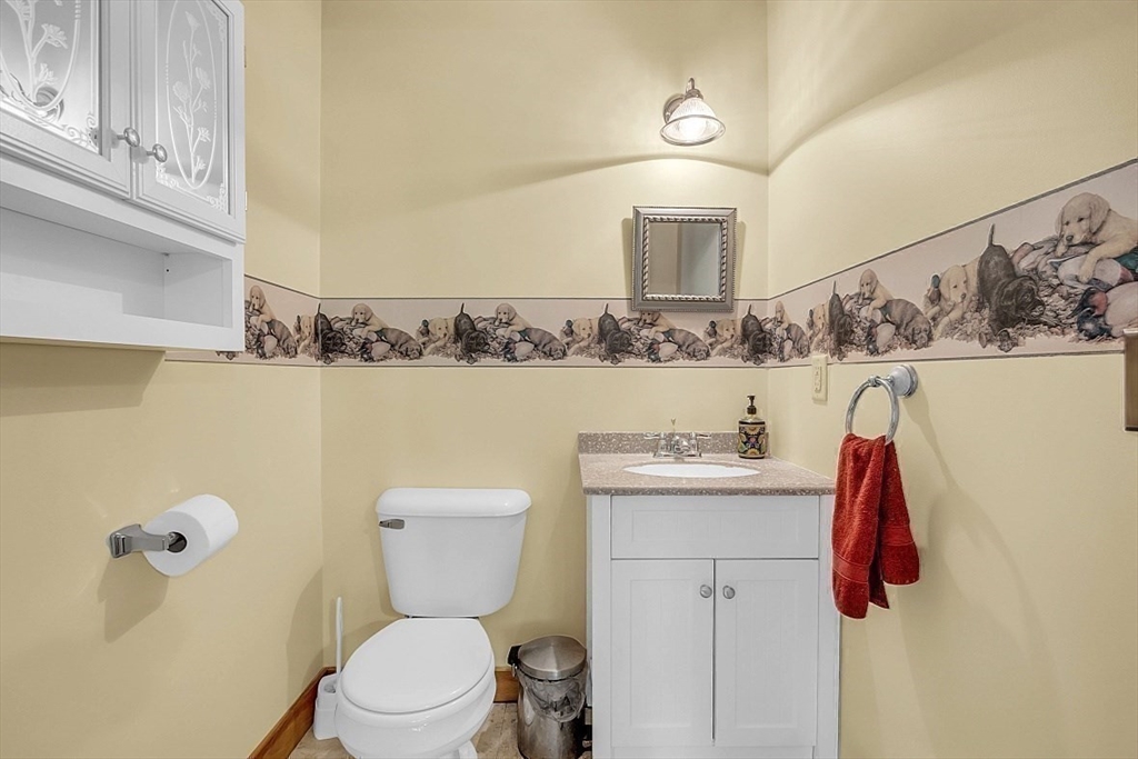 371 Walnut Hill Road Orange, MA 01364 - Photo 21 of 41 a bathroom with a sink a toilet and vanity