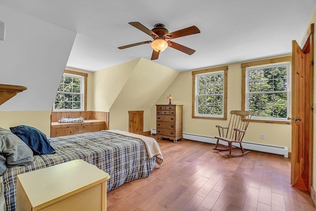 371 Walnut Hill Road Orange, MA 01364 - Photo 23 of 41 a bedroom with a bed and a window