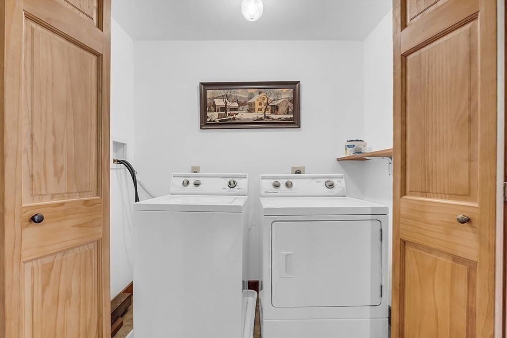 371 Walnut Hill Road Orange, MA 01364 - Photo 32 of 41 a utility room with dryer and washer