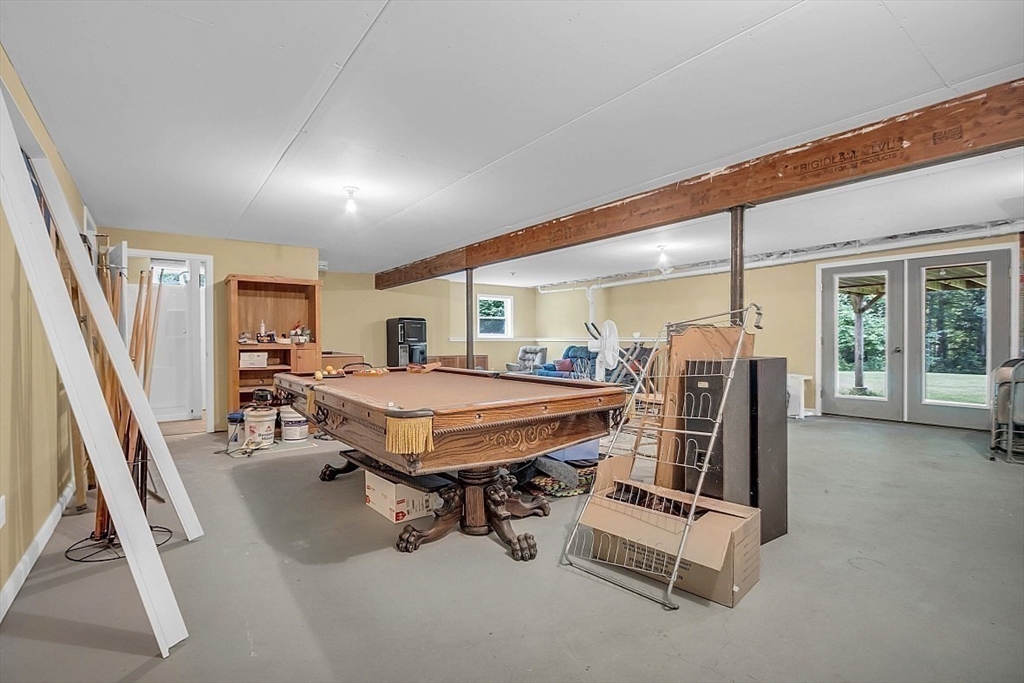 371 Walnut Hill Road Orange, MA 01364 - Photo 34 of 41 a room with table chairs and windows