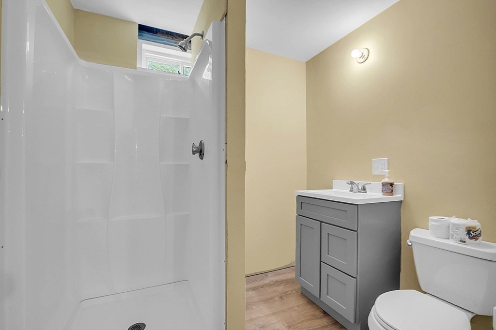 371 Walnut Hill Road Orange, MA 01364 - Photo 36 of 41 a bathroom with a granite countertop sink toilet and shower