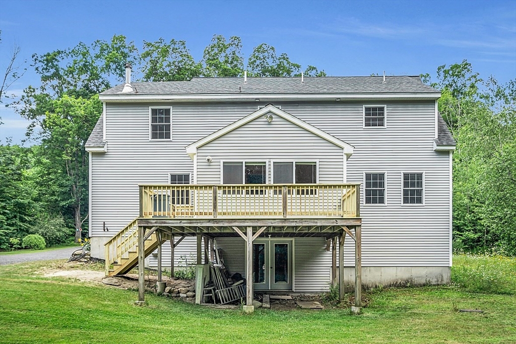 371 Walnut Hill Road Orange, MA 01364 - Photo 37 of 41 a front view of a house with a yard