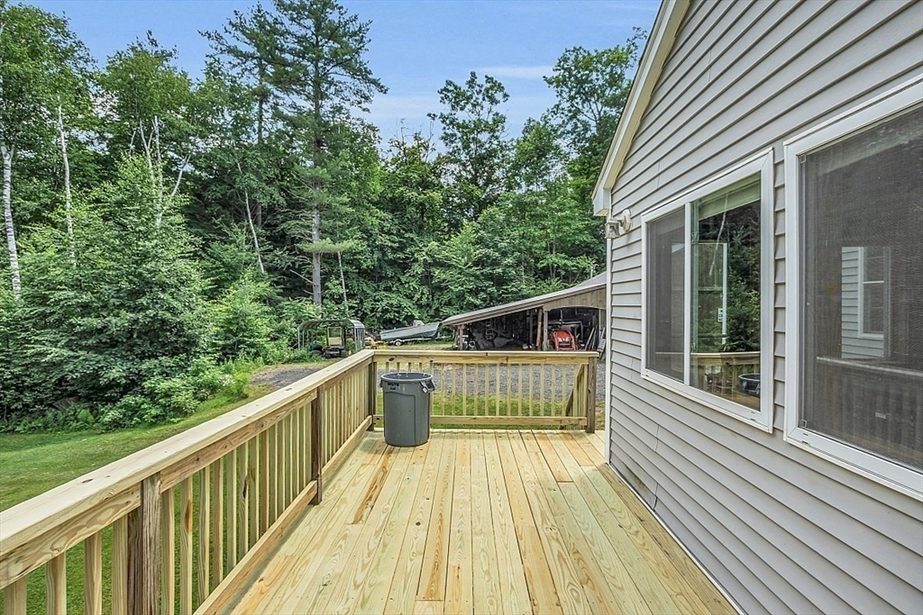 371 Walnut Hill Road Orange, MA 01364 - Photo 5 of 41 a view of balcony with deck and wooden floor