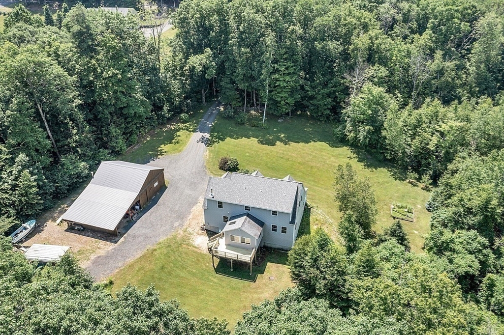 371 Walnut Hill Road Orange, MA 01364 - Photo 8 of 41 an aerial view of a house with swimming pool and garden