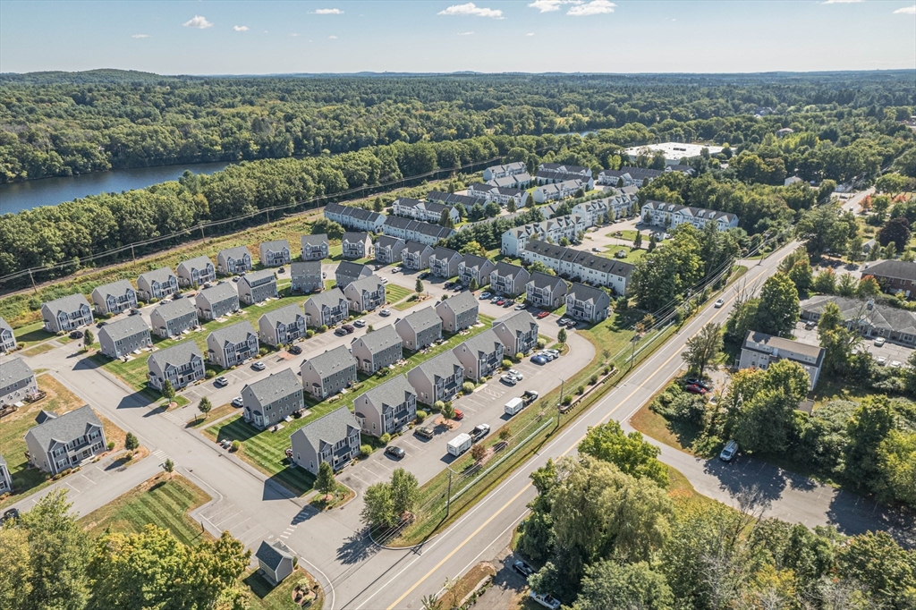 5 Riley Road, Unit 5 Tyngsboro, MA 01879 - Photo 4 of 4 an aerial view of a city