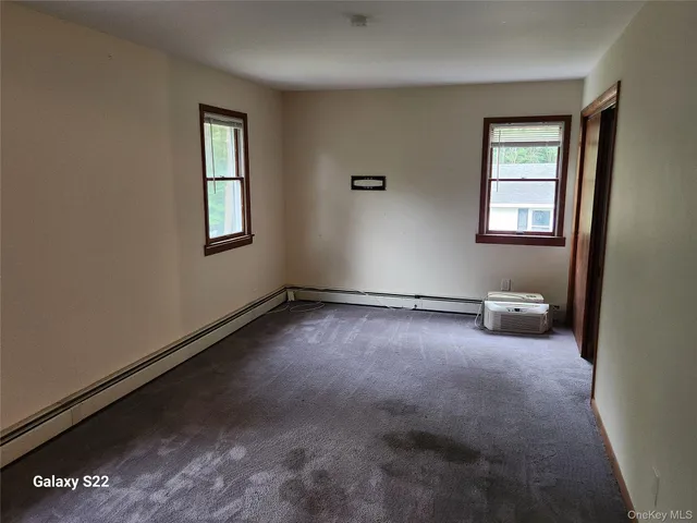 an empty room with windows