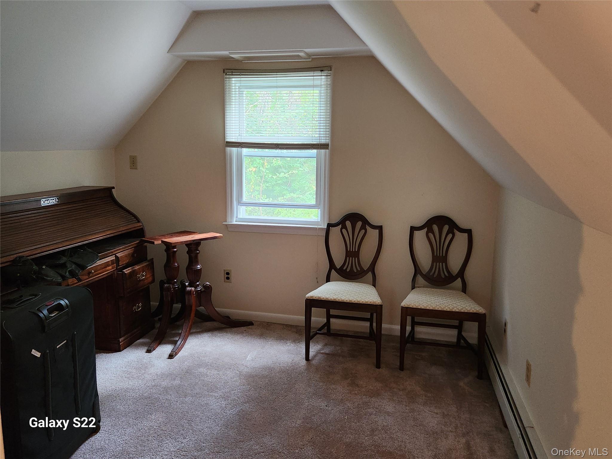 116 Croton Park Road Cortlandt Manor, NY 10567 - Photo 14 of 16 a room with chairs and two windows