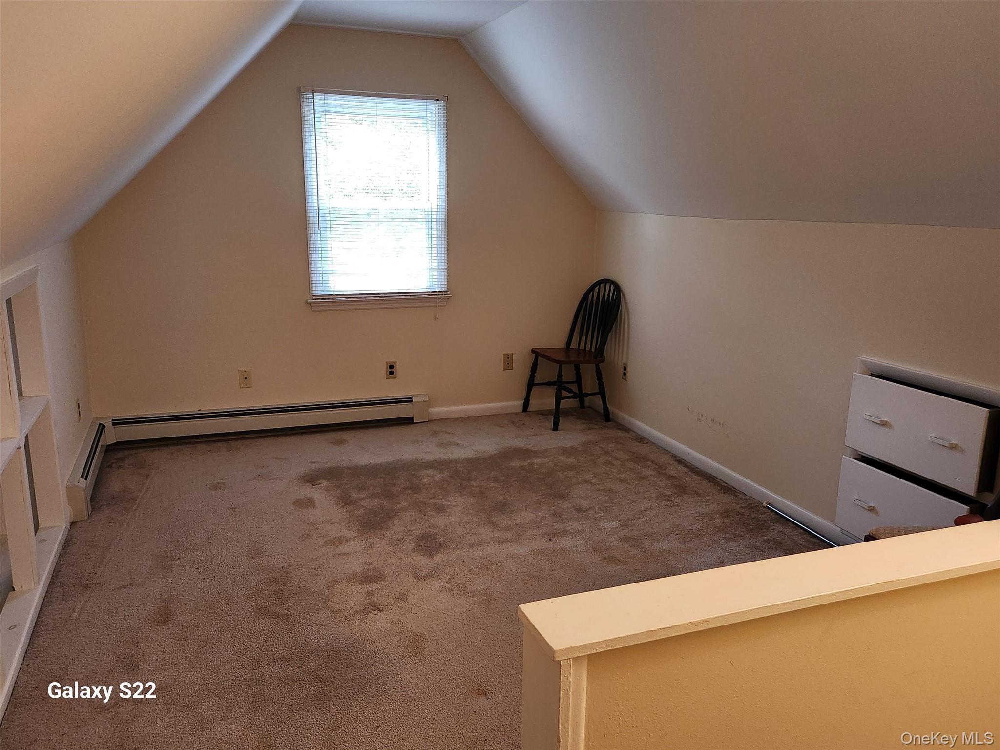 116 Croton Park Road Cortlandt Manor, NY 10567 - Photo 15 of 16 a view of a livingroom with an empty space and a window