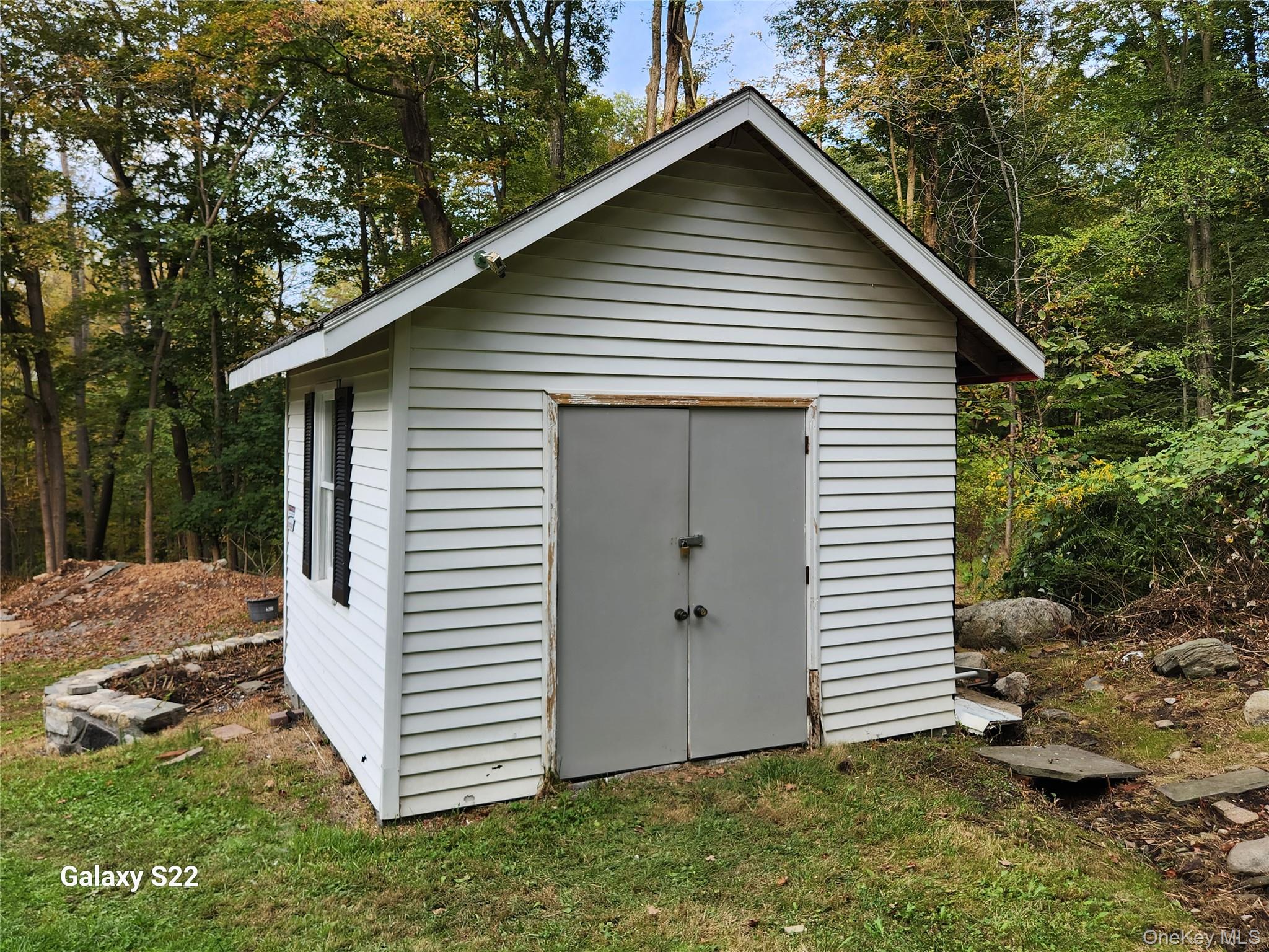 116 Croton Park Road Cortlandt Manor, NY 10567 - Photo 3 of 16 a view of backyard of house