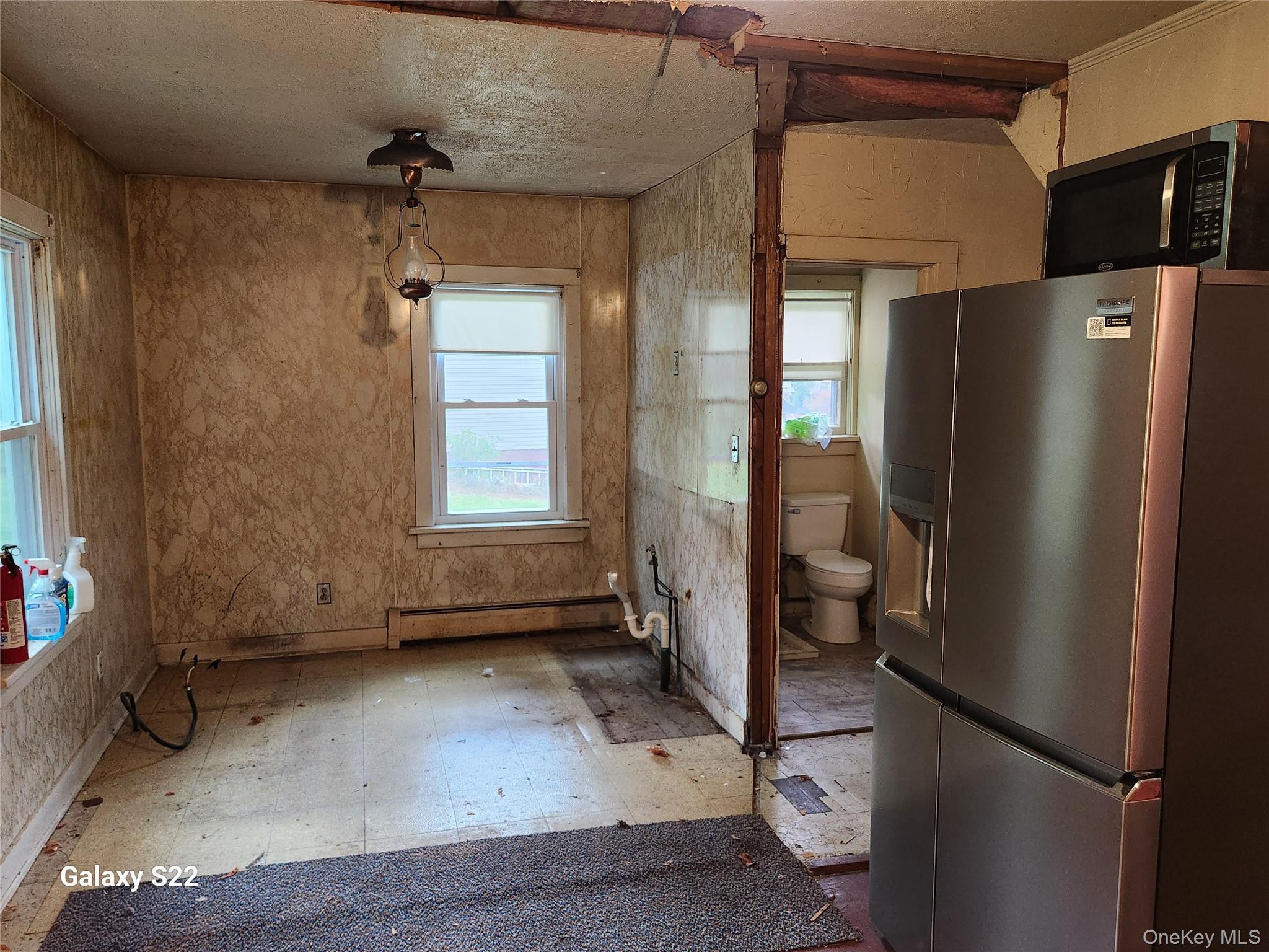 116 Croton Park Road Cortlandt Manor, NY 10567 - Photo 8 of 16 a view of empty room with a fireplace