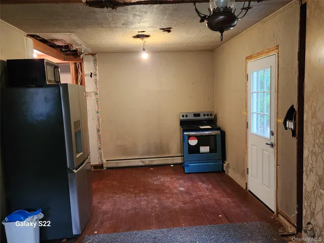 a view of a livingroom with a furniture
