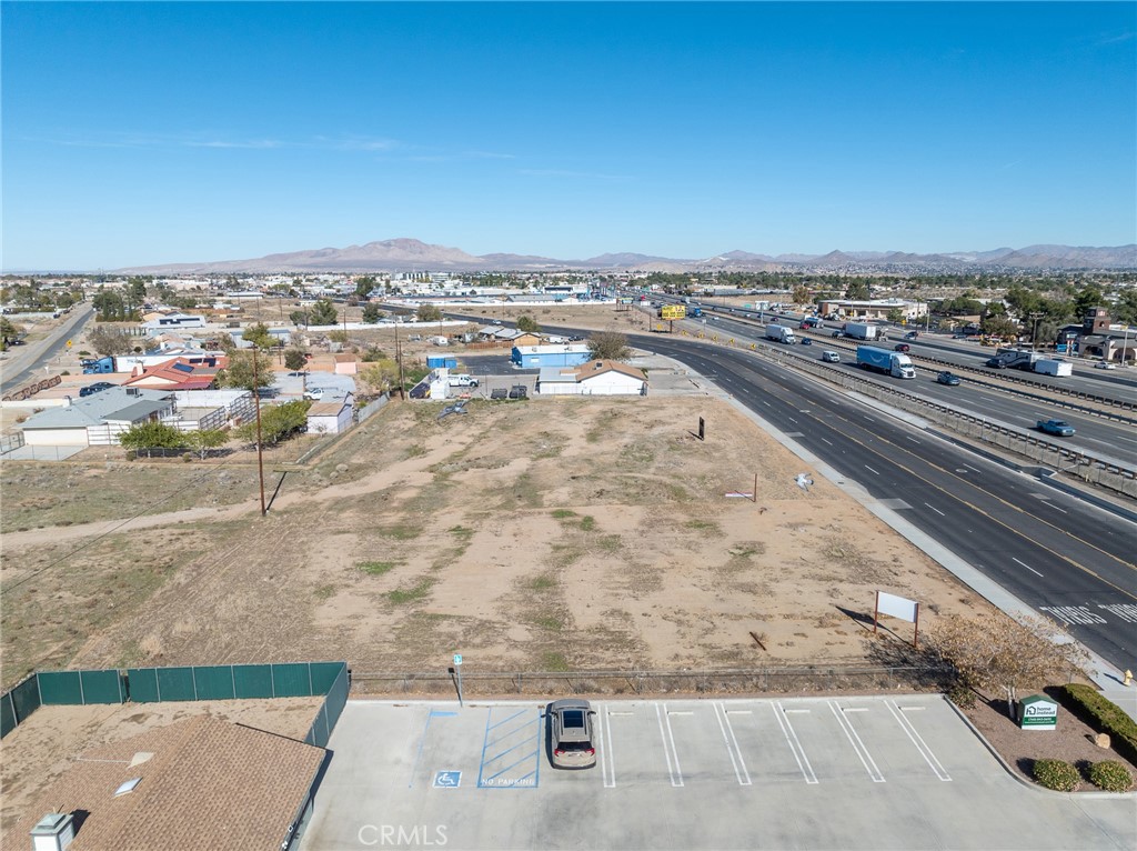 13346 Amargosa Road Victorville, CA 92392 - Photo 4 of 6 an aerial view of residential houses with outdoor space