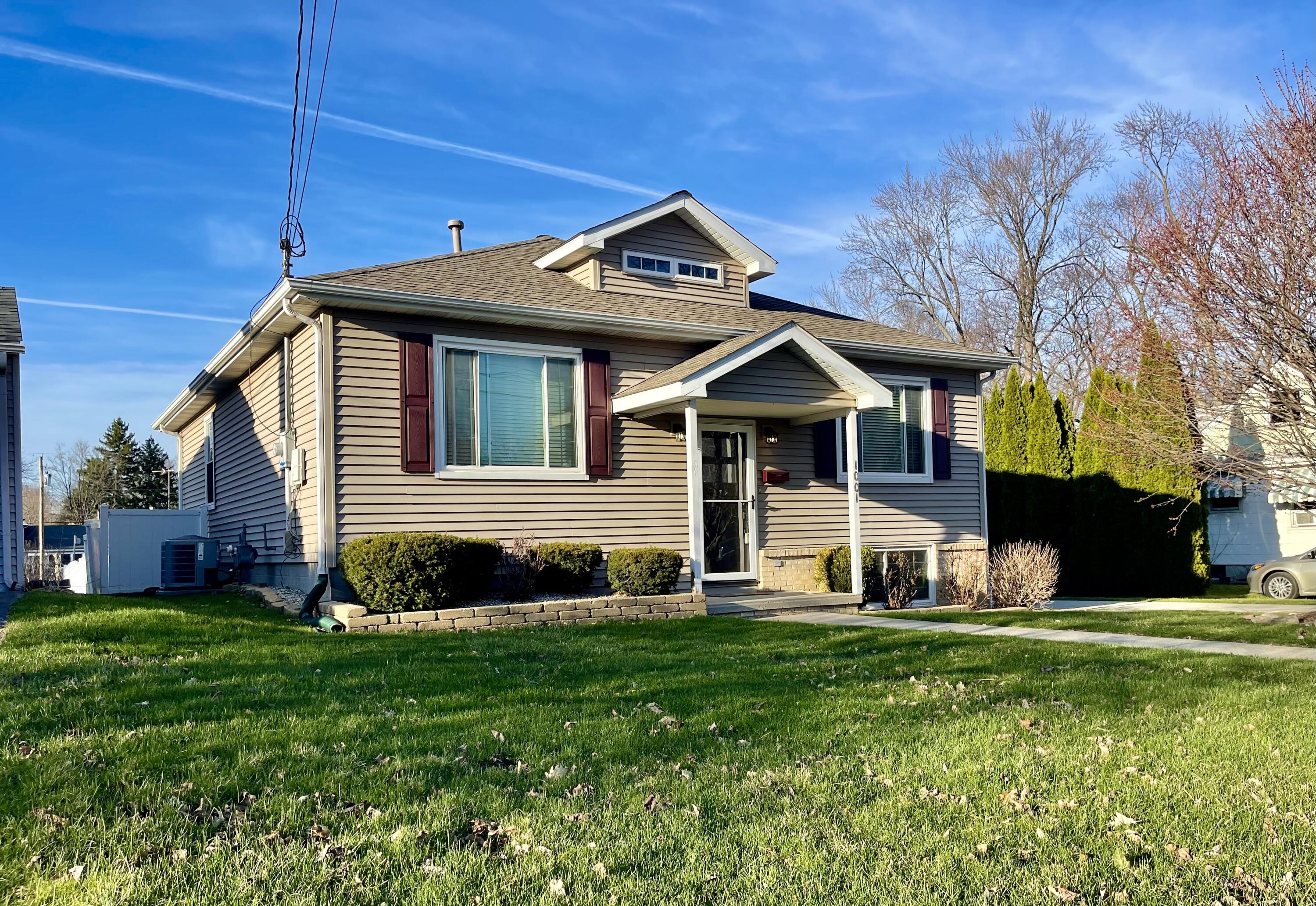 1001 Institute Street Valparaiso, IN 46383 - Photo 17 of 20 a front view of a house with a yard