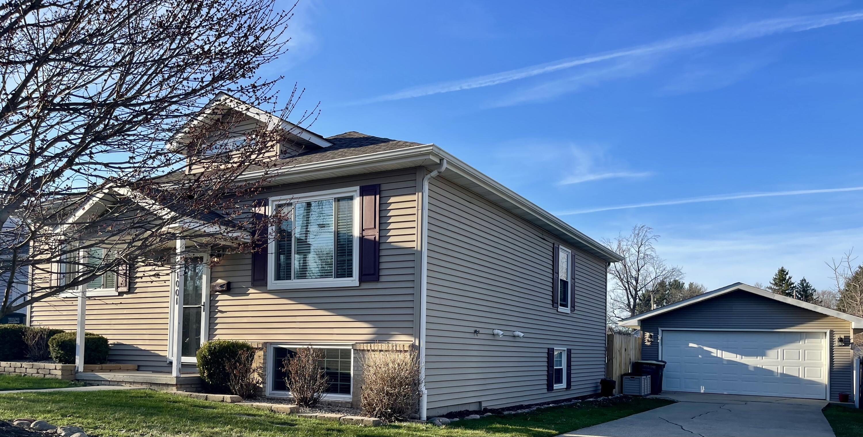 1001 Institute Street Valparaiso, IN 46383 - Photo 2 of 20 a front view of a house with a yard