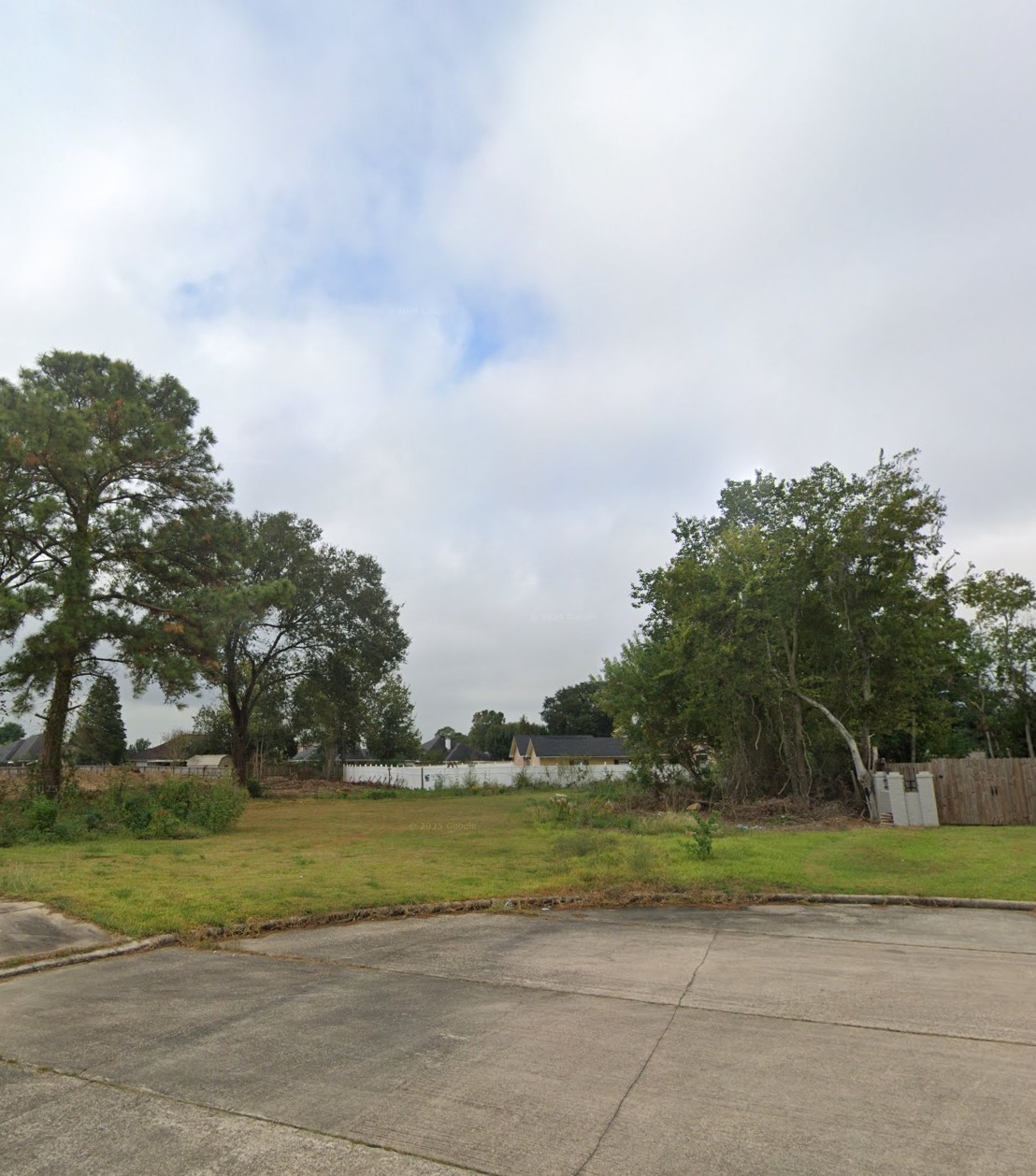 4100 Timber Leaf Court Port Arthur, TX 77642 - Photo 1 of 2 a view of a golf course with a lake