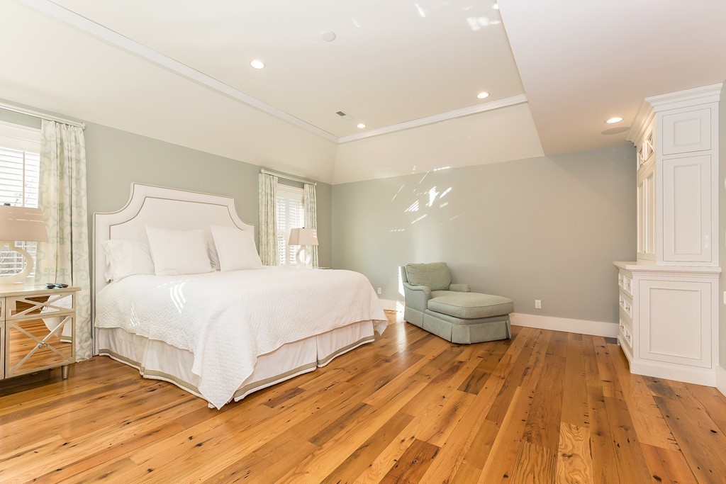 39 Middleby Road Lexington, MA 02421 - Photo 16 of 29 a bedroom with a bed and painting on the wall
