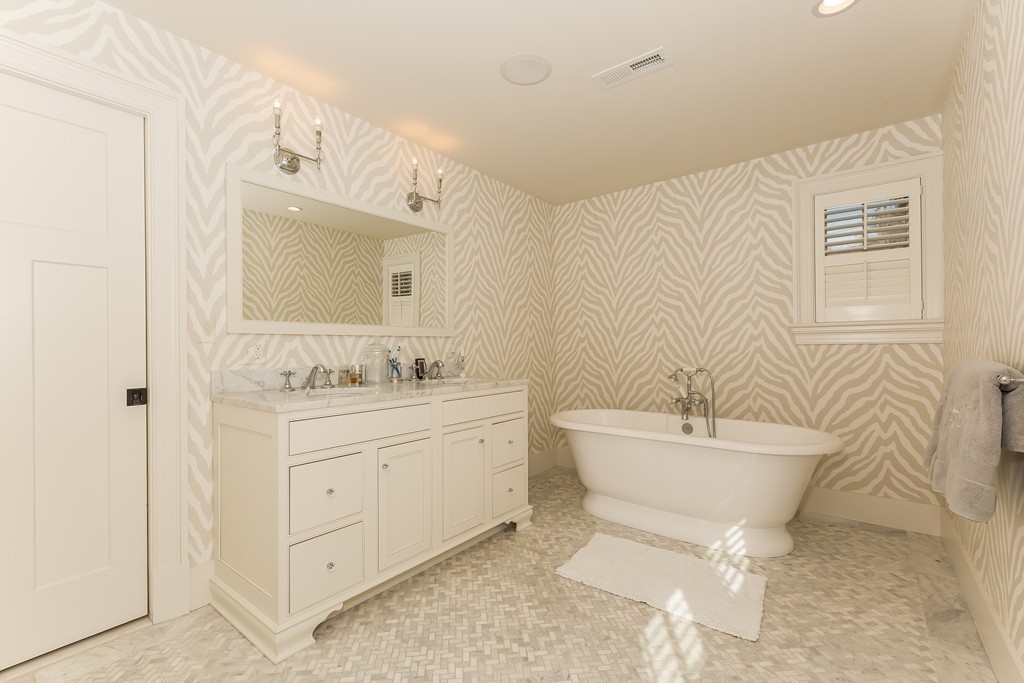 39 Middleby Road Lexington, MA 02421 - Photo 18 of 29 a bathroom with a sink mirror and a bathtub