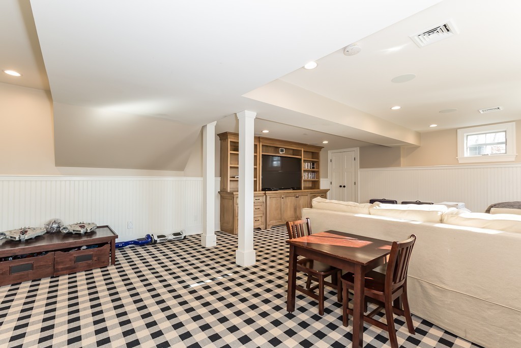 39 Middleby Road Lexington, MA 02421 - Photo 25 of 29 a room with a table and chairs