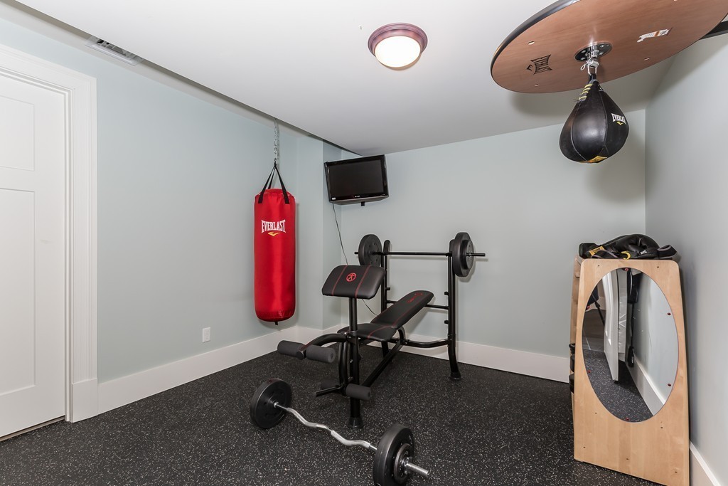 39 Middleby Road Lexington, MA 02421 - Photo 27 of 29 a view of a room with gym equipment