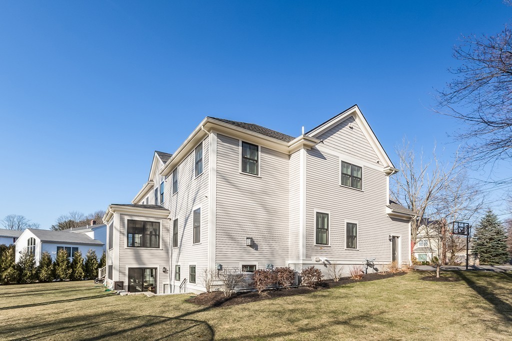 39 Middleby Road Lexington, MA 02421 - Photo 29 of 29 a view of a white house with a yard