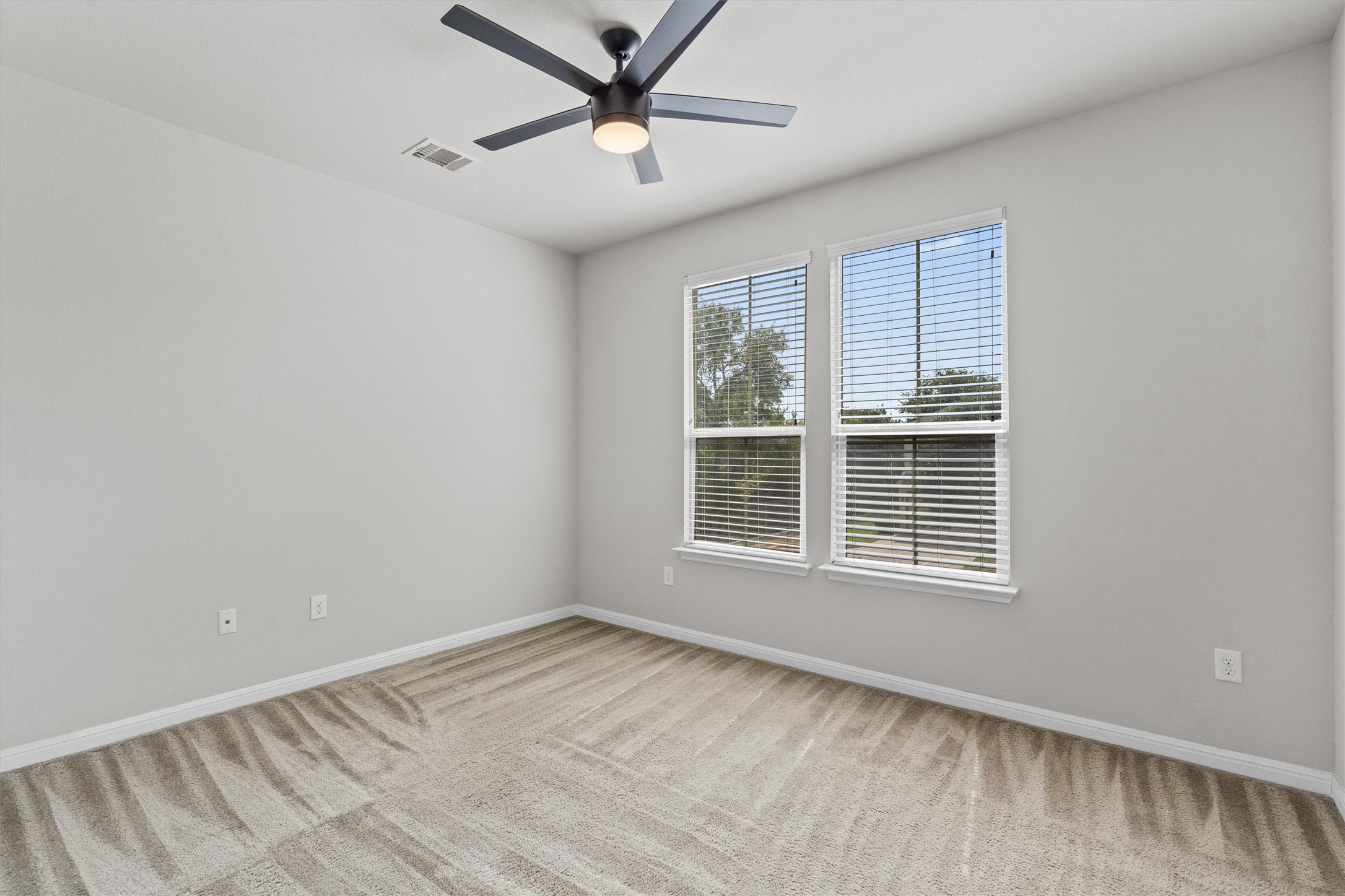 7709 Menchaca Road, Unit 22 Austin, TX 78745 - Photo 24 of 35 an empty room with a window