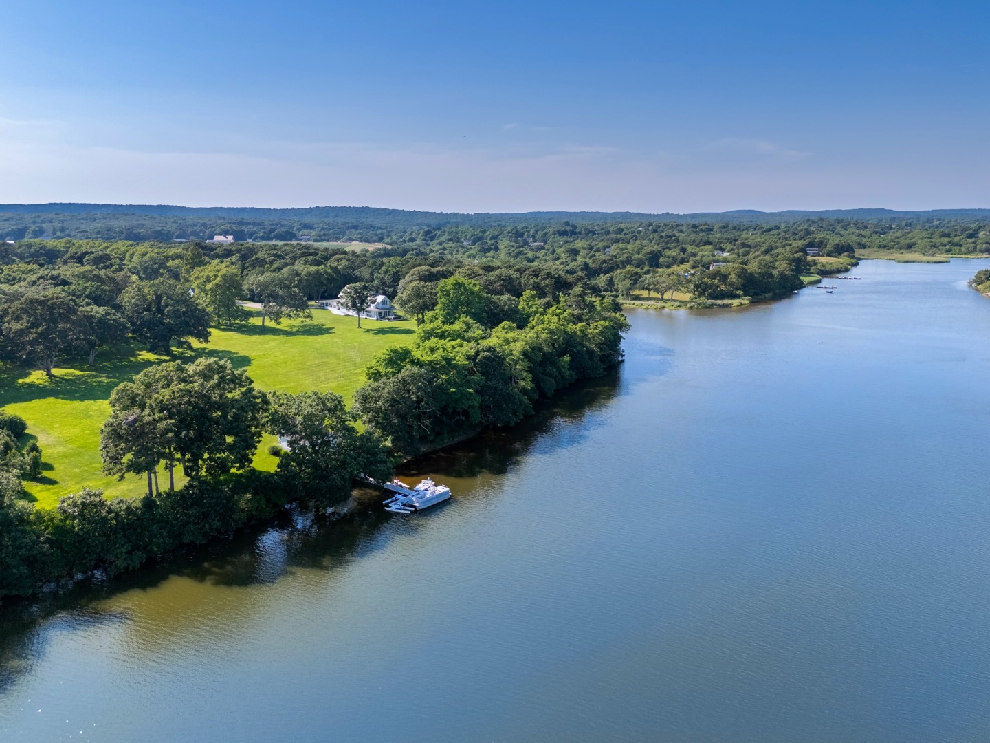41 Cobbs Hill Road Chilmark, MA 02535 - Photo 3 of 46 a view of a lake with a city view