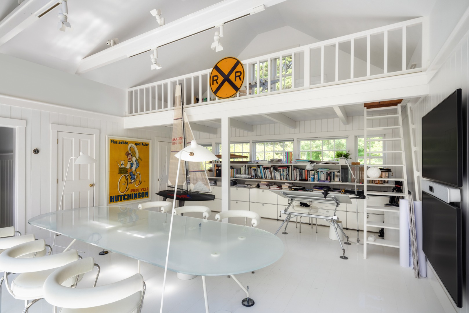 41 Cobbs Hill Road Chilmark, MA 02535 - Photo 36 of 46 a dining hall with couches a flat tv screen and a dining table with the kitchen view