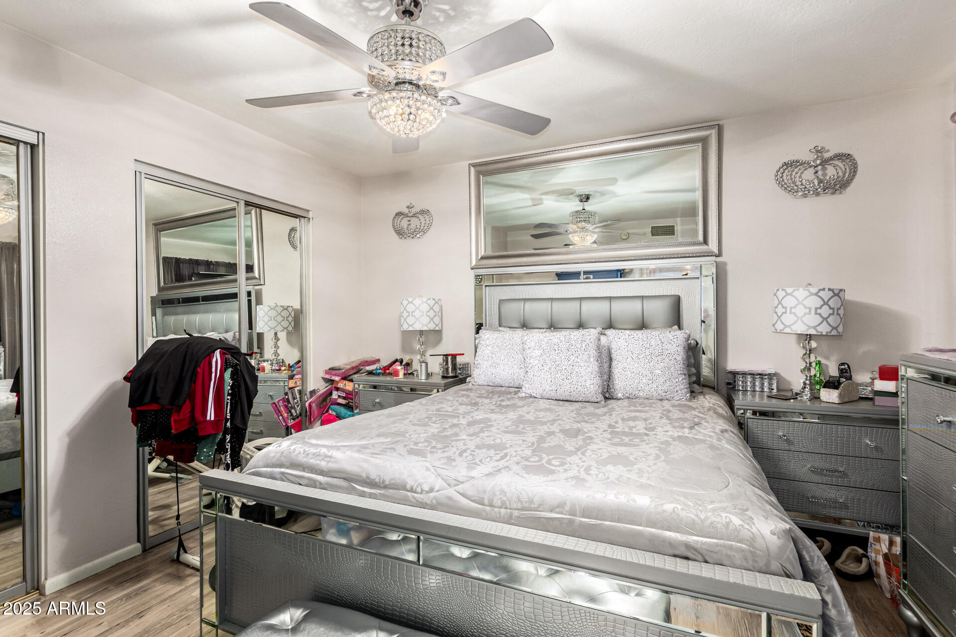 4028 East Carson Road Phoenix, AZ 85042 - Photo 14 of 26 a bedroom with a bed and ceiling fan