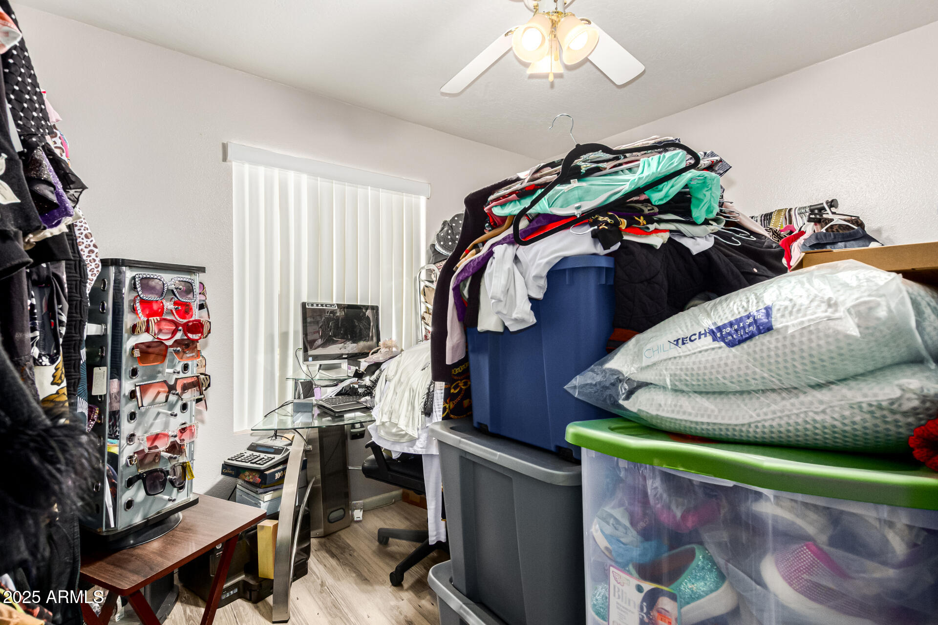 4028 East Carson Road Phoenix, AZ 85042 - Photo 20 of 26 a bed room with a bed and a tv
