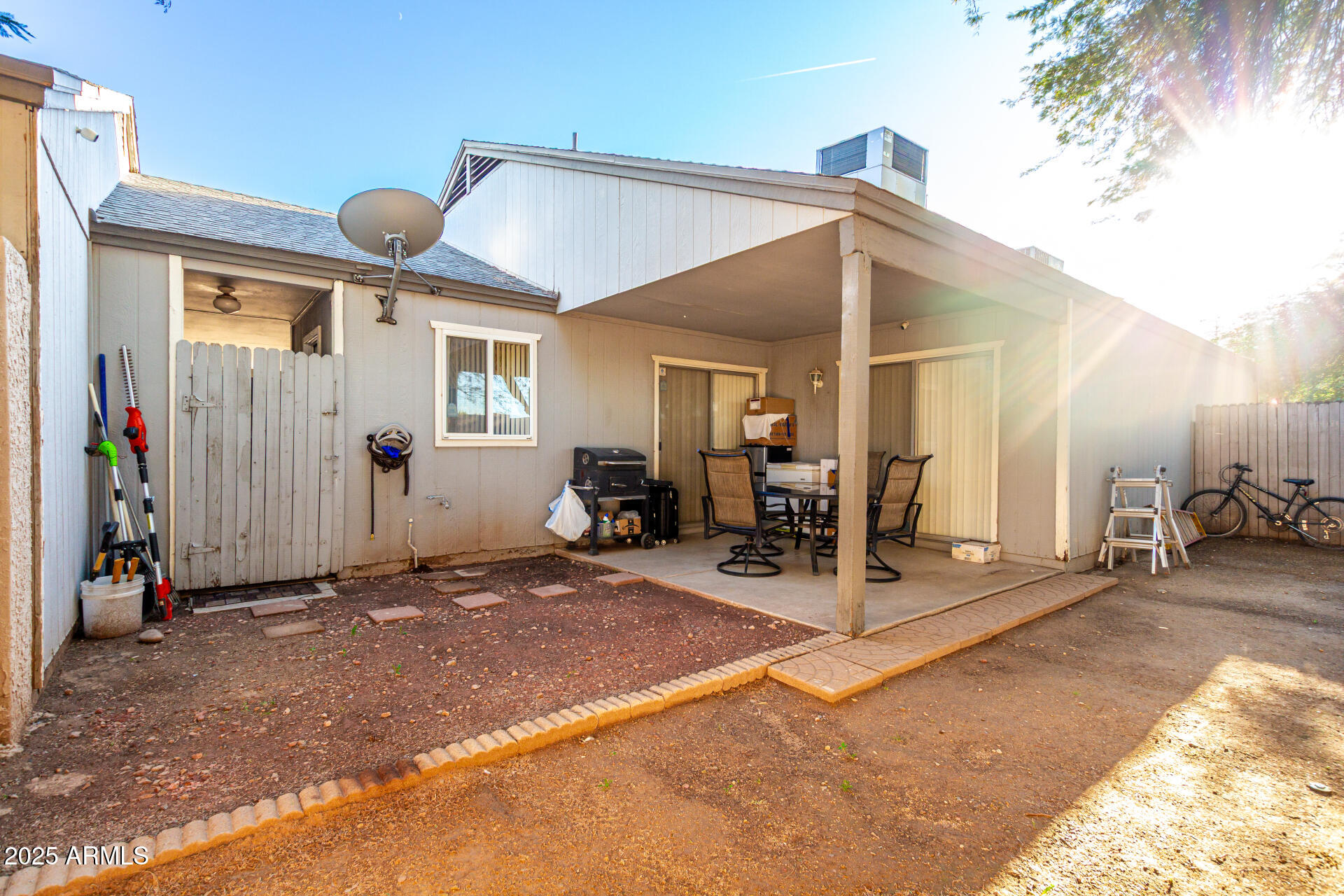 4028 East Carson Road Phoenix, AZ 85042 - Photo 24 of 26 a view of a patio with table and chairs