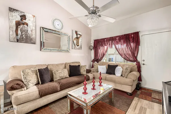 a living room with furniture and a couch