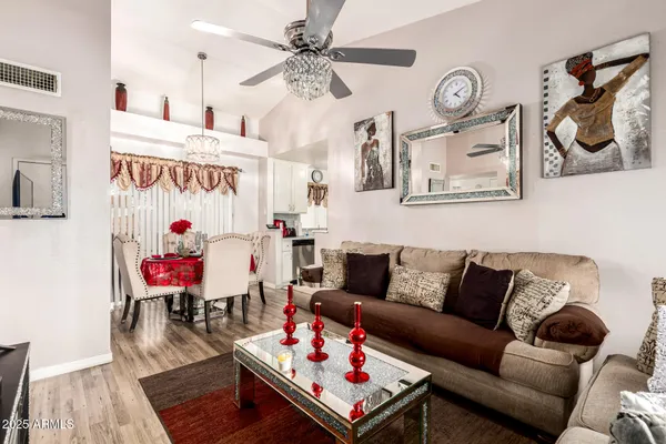 a living room with furniture and a couch