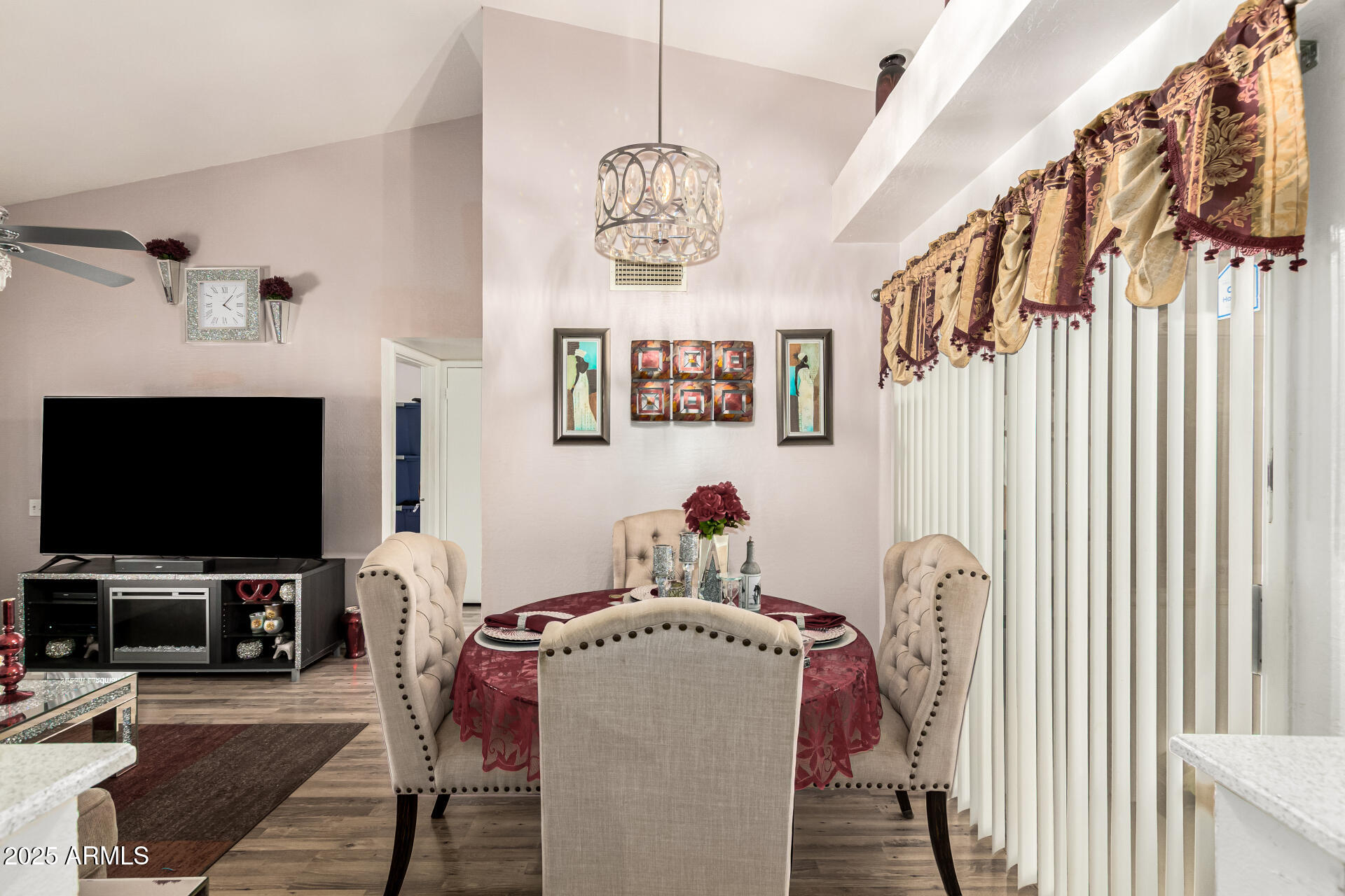 4028 East Carson Road Phoenix, AZ 85042 - Photo 9 of 26 a view of a livingroom with furniture and a flat screen tv