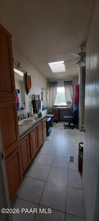 a bathroom with a sink toilet and vanity