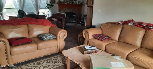 a bed room with a bed and a chandelier