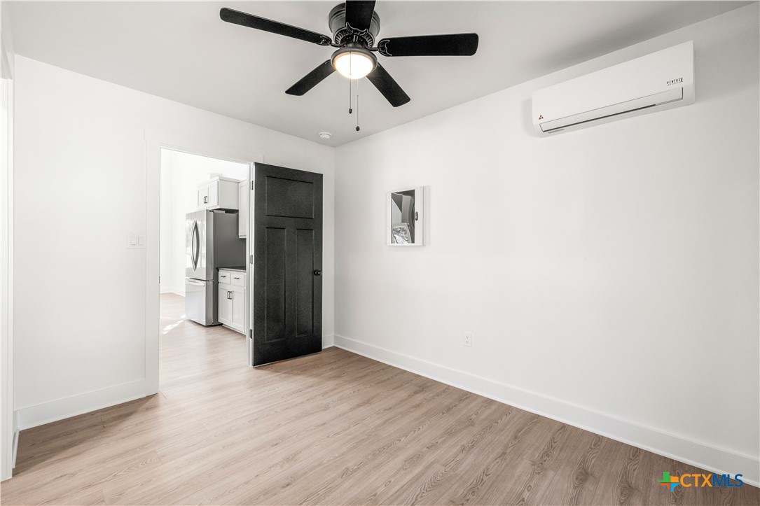 7660 McGregor Park Road Temple, TX 76502 - Photo 12 of 47 wooden floor in an empty room