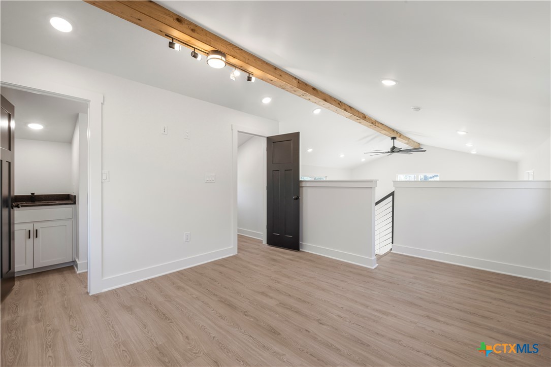 7660 McGregor Park Road Temple, TX 76502 - Photo 15 of 47 a view of an empty room with wooden floor