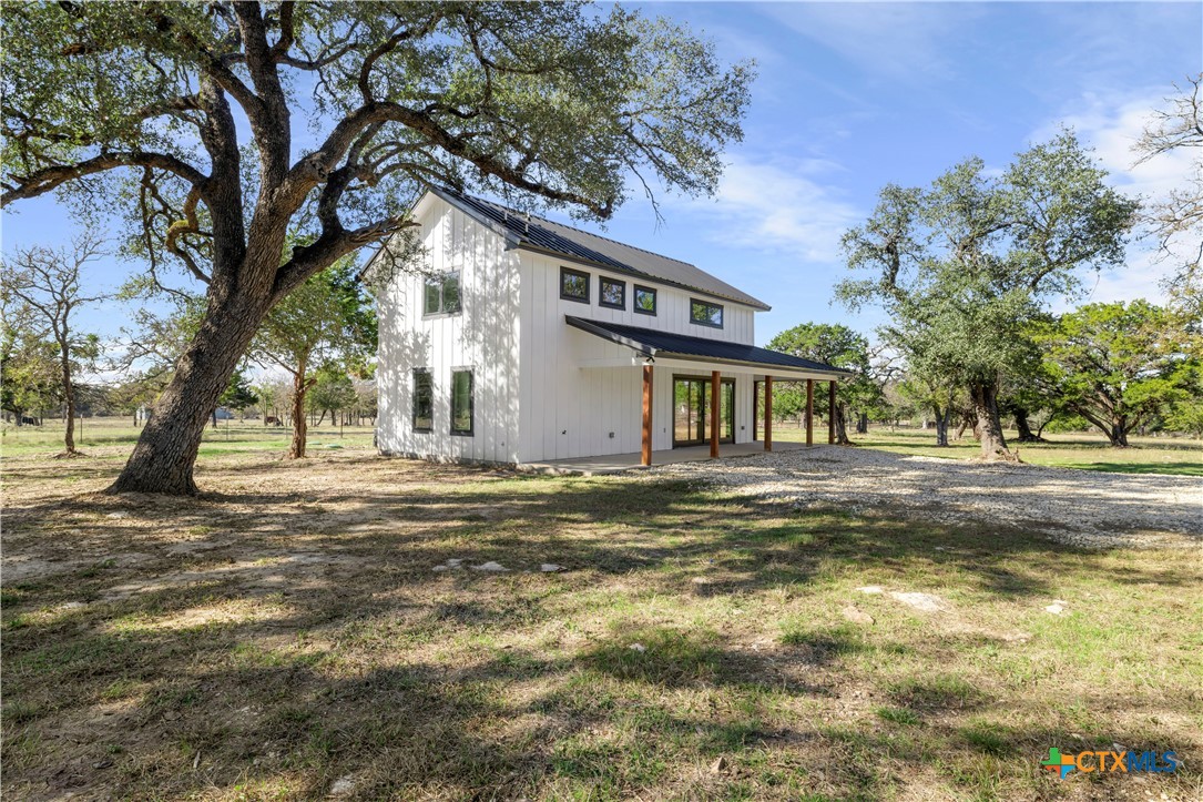 7660 McGregor Park Road Temple, TX 76502 - Photo 19 of 47 a front view of a house with a yard