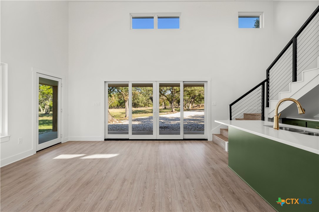 7660 McGregor Park Road Temple, TX 76502 - Photo 26 of 47 a view of a room with window and hardwood
