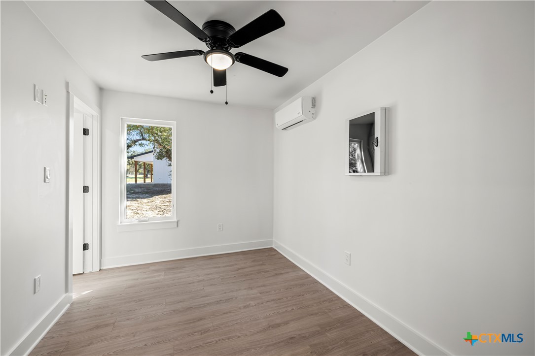 7660 McGregor Park Road Temple, TX 76502 - Photo 29 of 47 wooden floor in an empty room