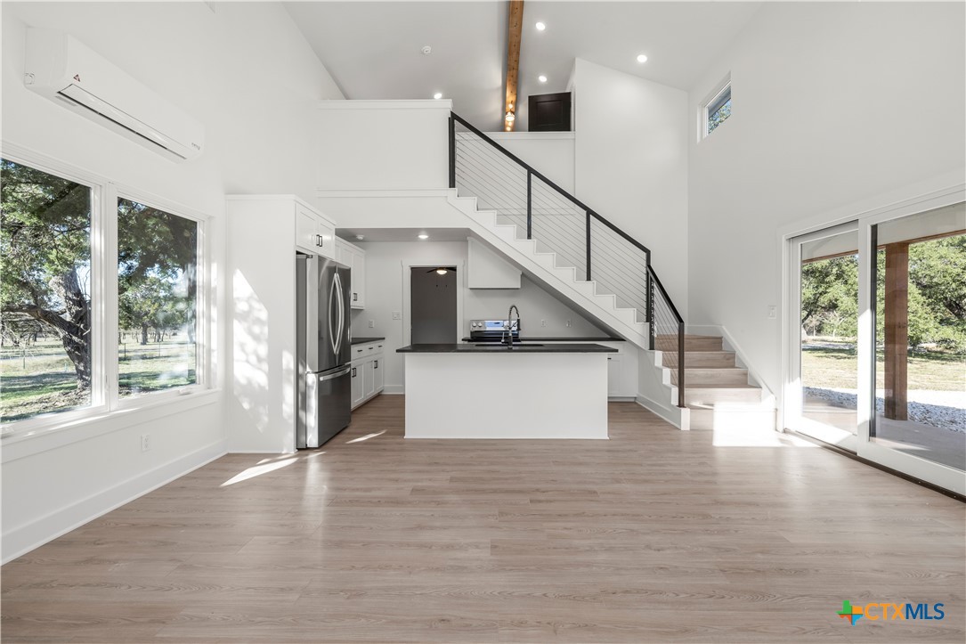 7660 McGregor Park Road Temple, TX 76502 - Photo 5 of 47 a view of entryway and hall with wooden floor