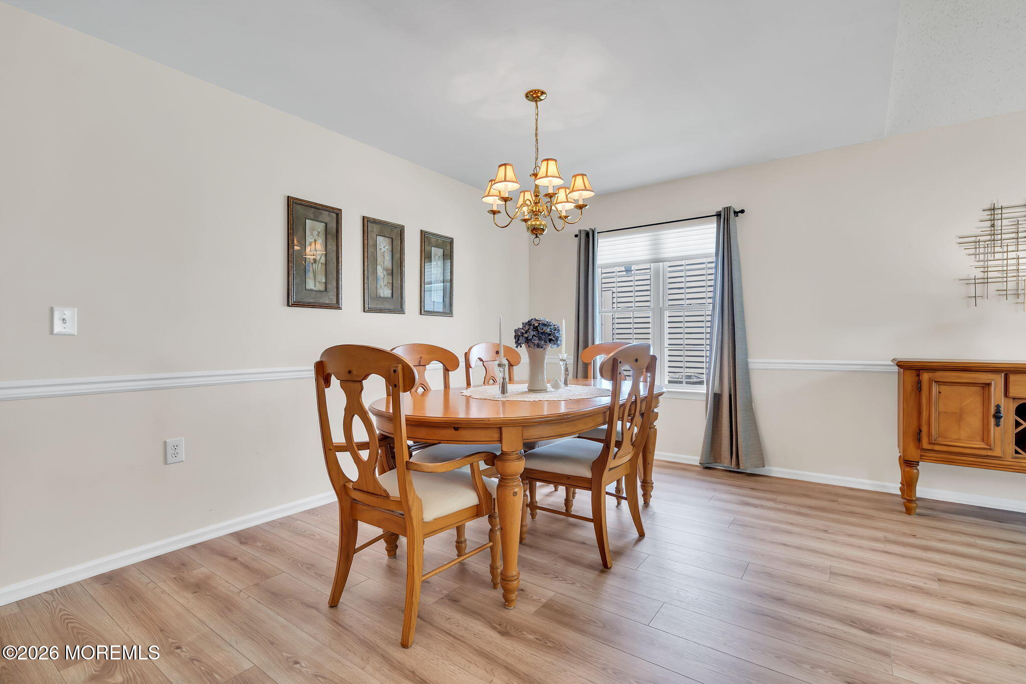 10 Congressional Road Jackson, NJ 08527 - Photo 10 of 72 a view of a dining room with furniture wooden floor and chandelier