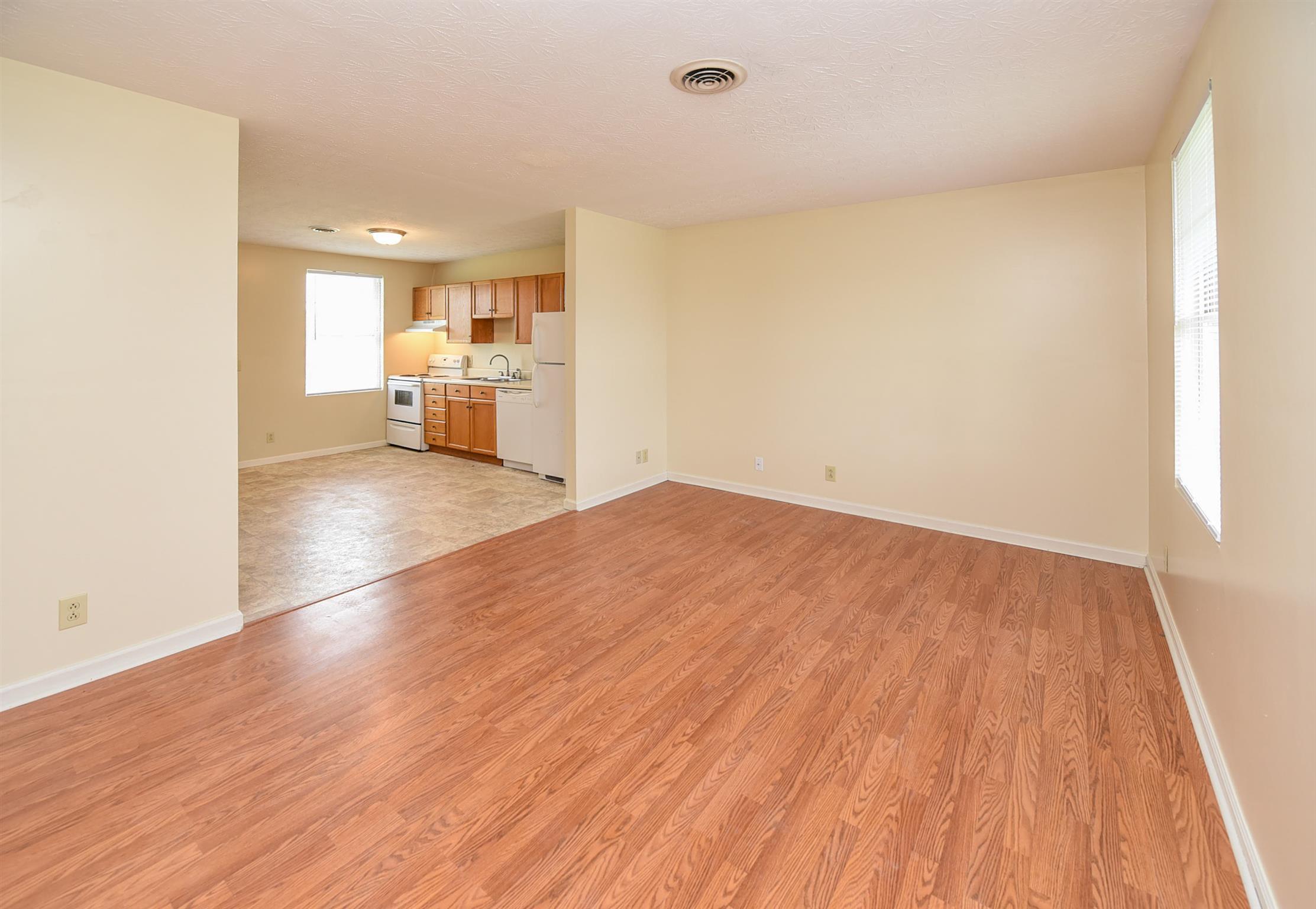 2000 R W Gordon Drive Springfield, TN 37172 - Photo 9 of 21 an empty room with wooden floor and windows