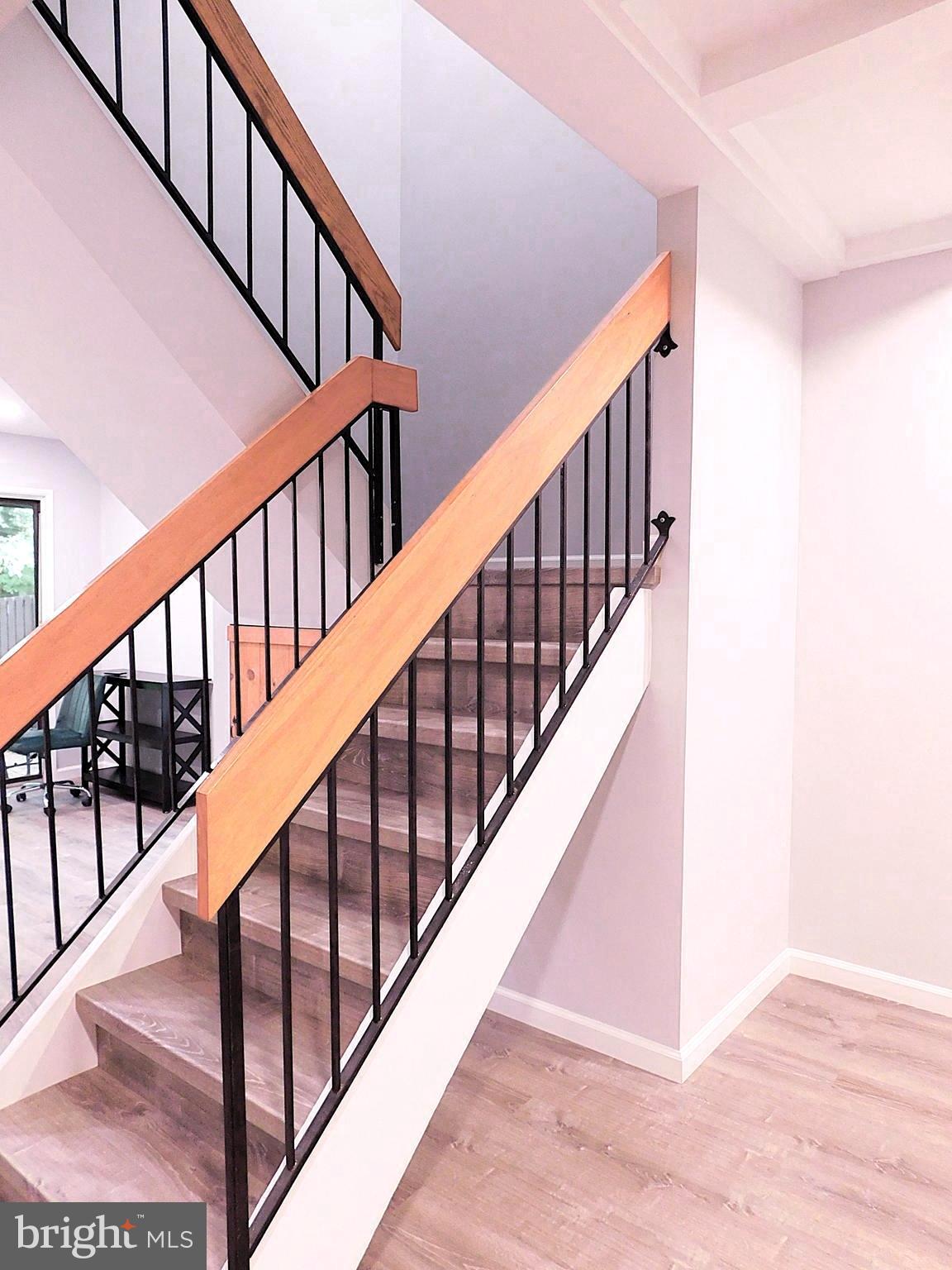 2241 Cartwright Place Reston, VA 20191 - Photo 23 of 40 Newly remodelled staircase (6/25) with LVP treads