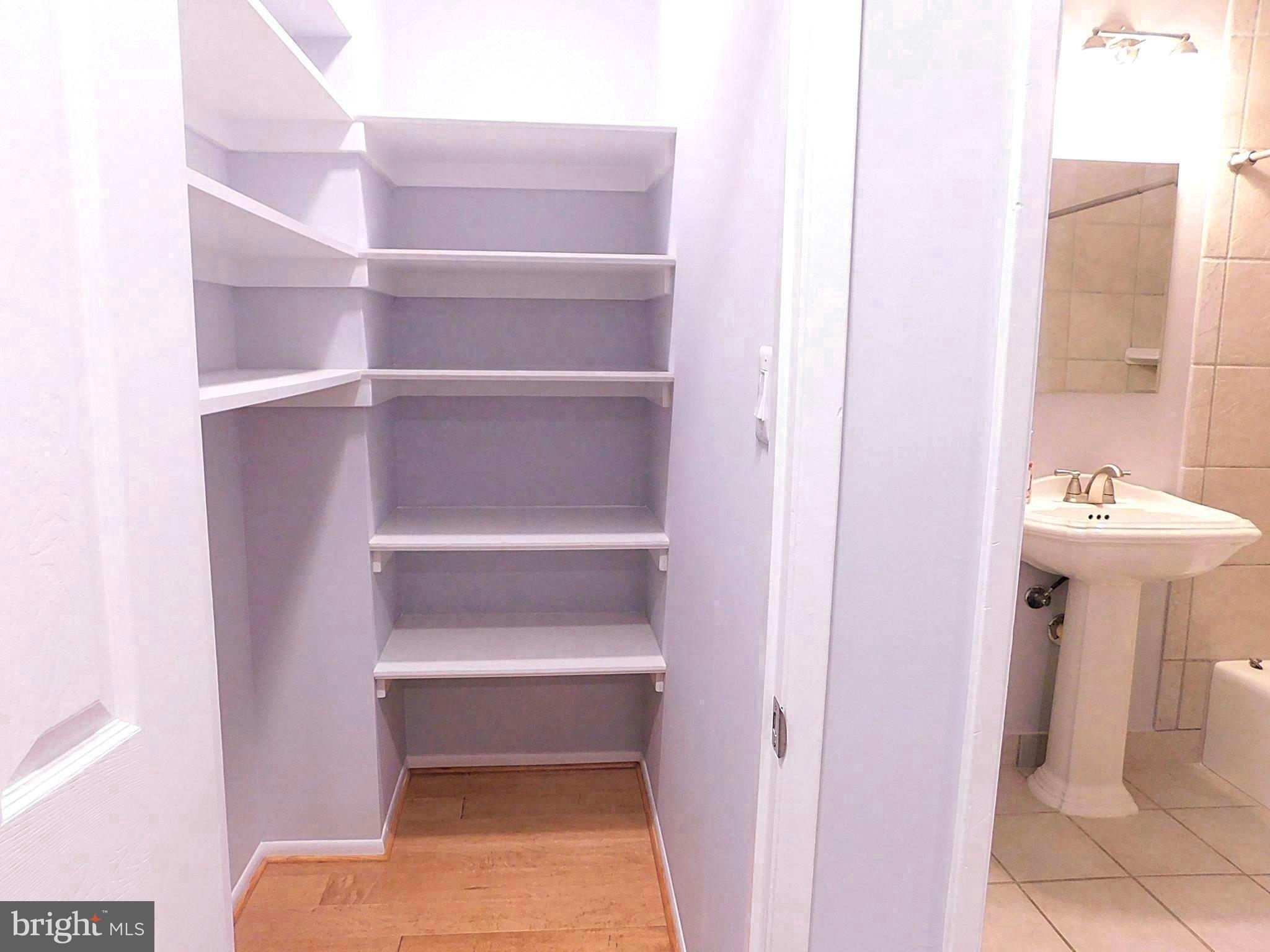 2241 Cartwright Place Reston, VA 20191 - Photo 28 of 40 Deep hallway walk-in closet has abundant storage