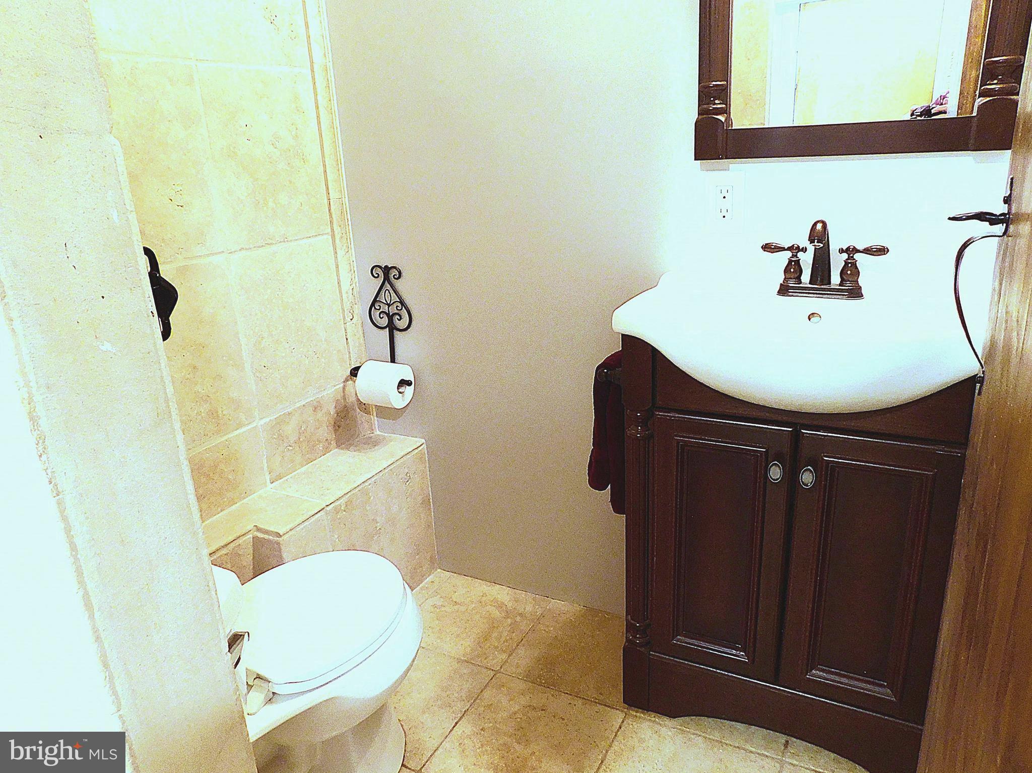 2241 Cartwright Place Reston, VA 20191 - Photo 7 of 40 Remodeled HBA, newer vanity, lites, 12" tile floo