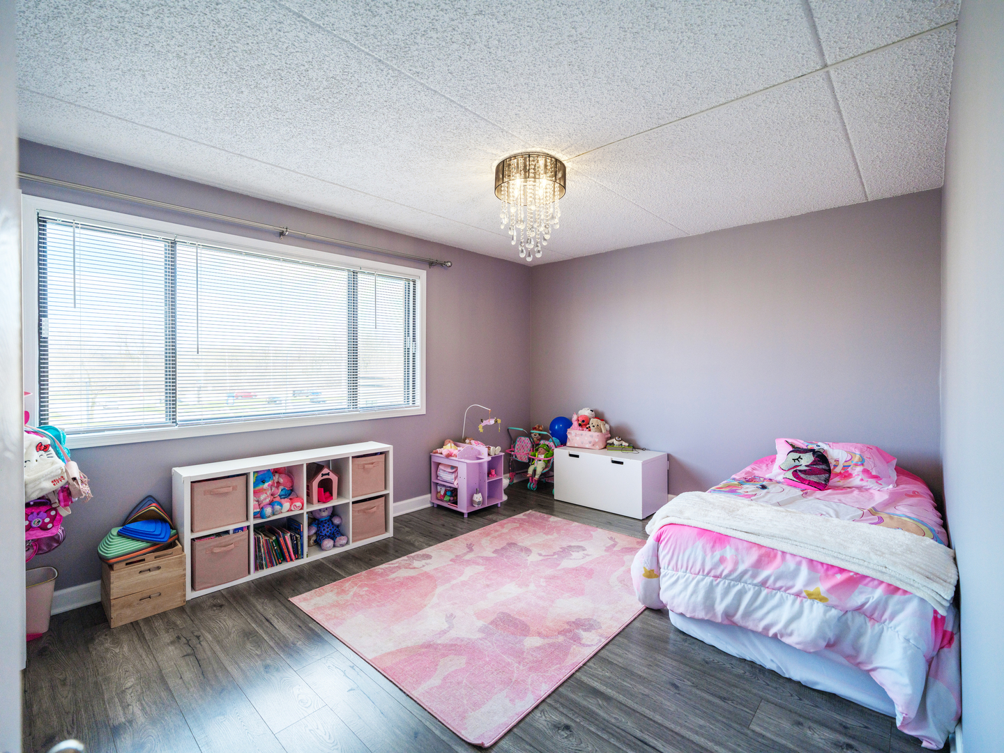 1215 Chalet Road, Unit 200 Naperville, IL 60563 - Photo 6 of 15 a bedroom with two beds and a wooden floor