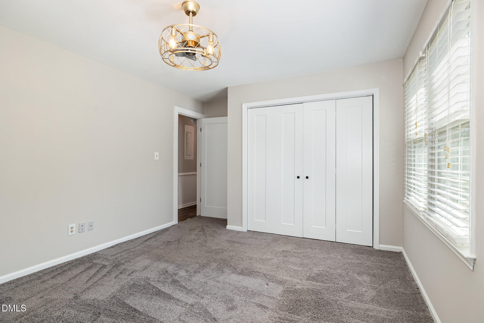 414 Aquilla Road Benson, NC 27504 - Photo 12 of 30 a view of an empty room with a window