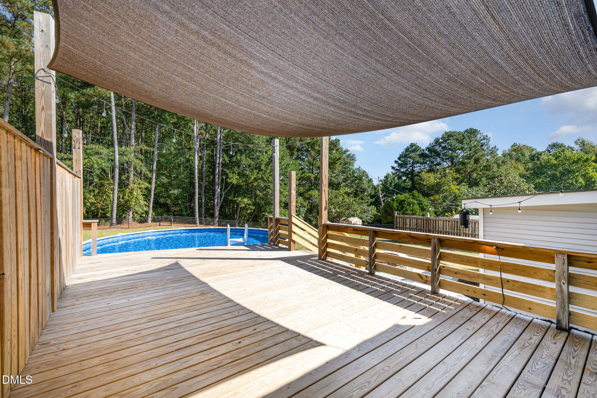 414 Aquilla Road Benson, NC 27504 - Photo 21 of 30 a view of outdoor space with deck and backyard