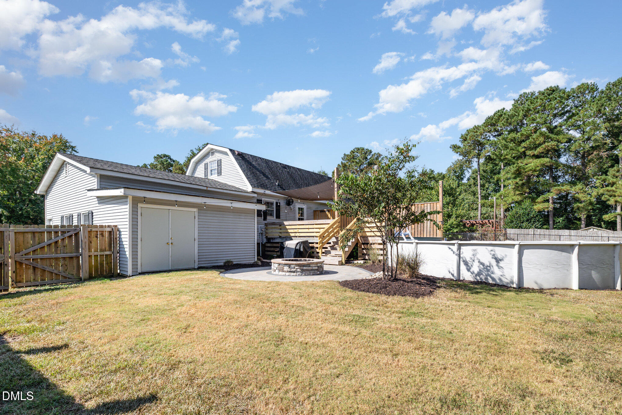 414 Aquilla Road Benson, NC 27504 - Photo 24 of 30 a view of a house with wooden fence
